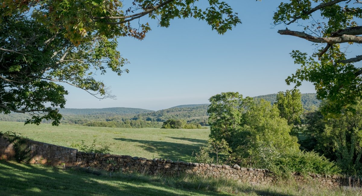 Wakefield school oudoor rock fence and view of the plains