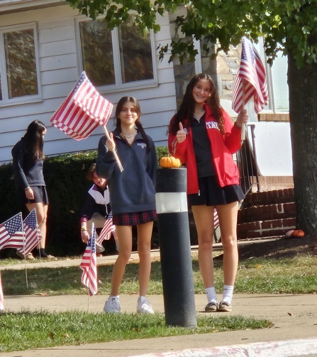 two students participating in Community Council club activities