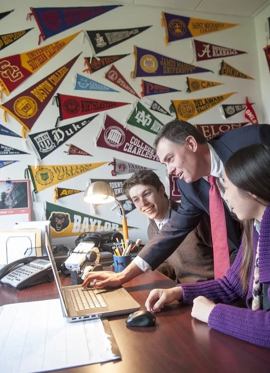 student and teacher working on an assignment
