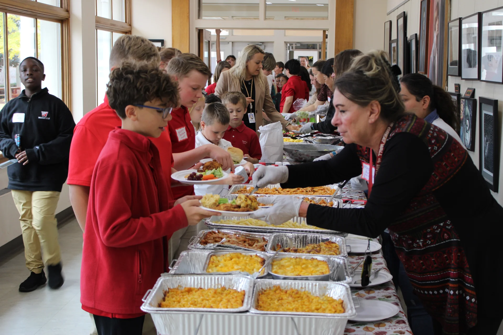 parents serving food at an event